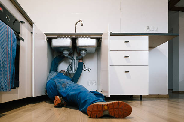 Professional Plumbing technician working in Dema, KY
